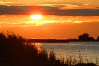 Sonnenuntergang am Bodstedter Bodden - Bild vergrößern ...